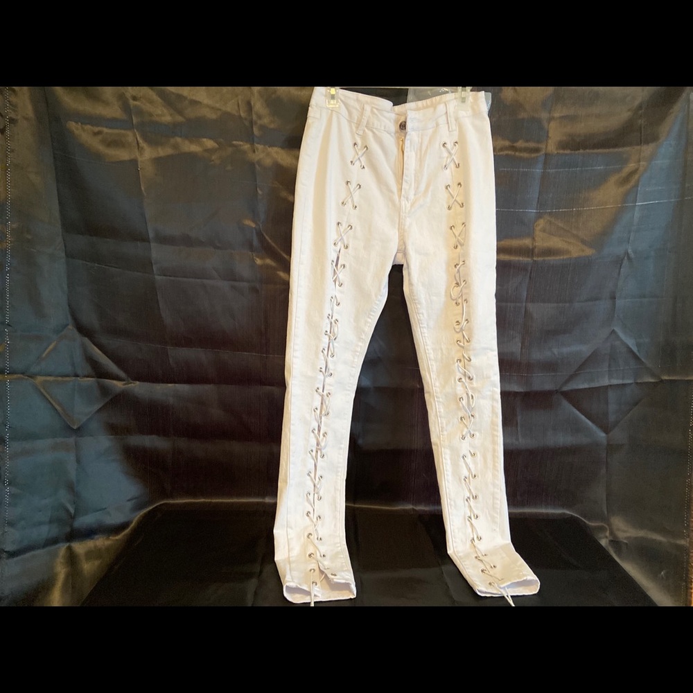 White lace up skinny leg jeans